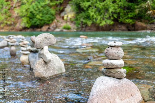 Boulders stacked into a formation of rocks in the Cowlitz river, near the La Wis Wis Campground. Washington State.