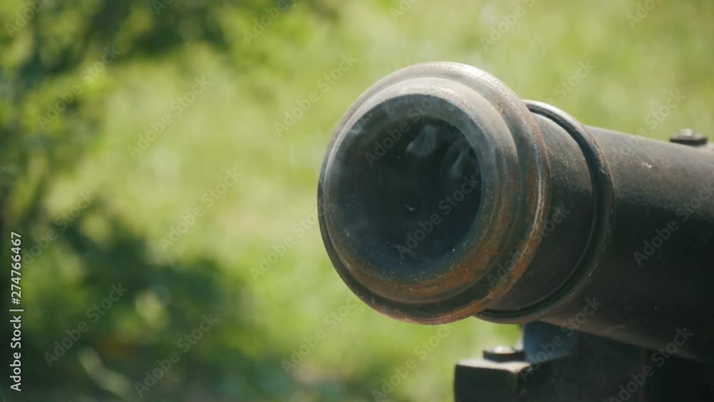 realistic cossak's cannon is being shot on the retro Ukrainian festival otdoors, Close up realistic cossak's cannon is being shot on the retro Ukrainian festival otdoors, Close up