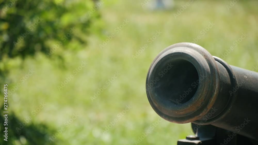 realistic cossak's cannon is being shot on the retro Ukrainian festival otdoors, Close up realistic cossak's cannon is being shot on the retro Ukrainian festival otdoors, Close up