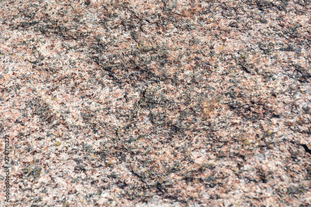 the texture of natural granite. natural stone. close up. the texture of natural granite. natural stone. close up.