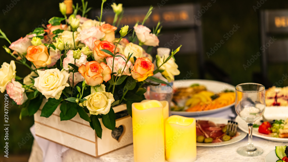 flowers and food are on the table, holiday flowers and food are on the table, holiday