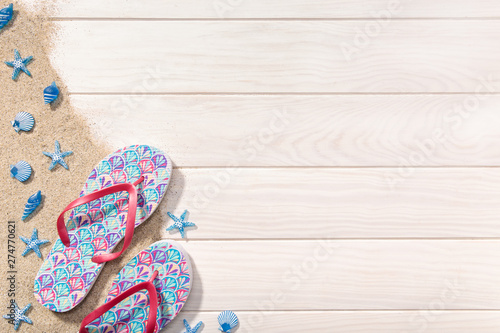 Summer background. White Wooden background with beach items. Copy space