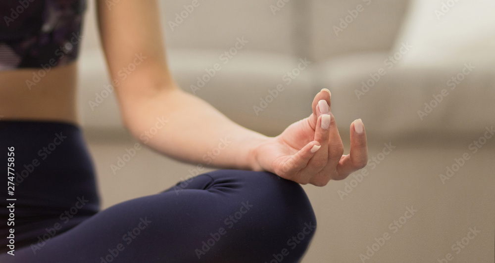 Yogi Woman Practicing Yoga, Sitting In Padmasana, Closeup