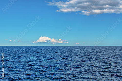 Cloud over a deep blue sea ...