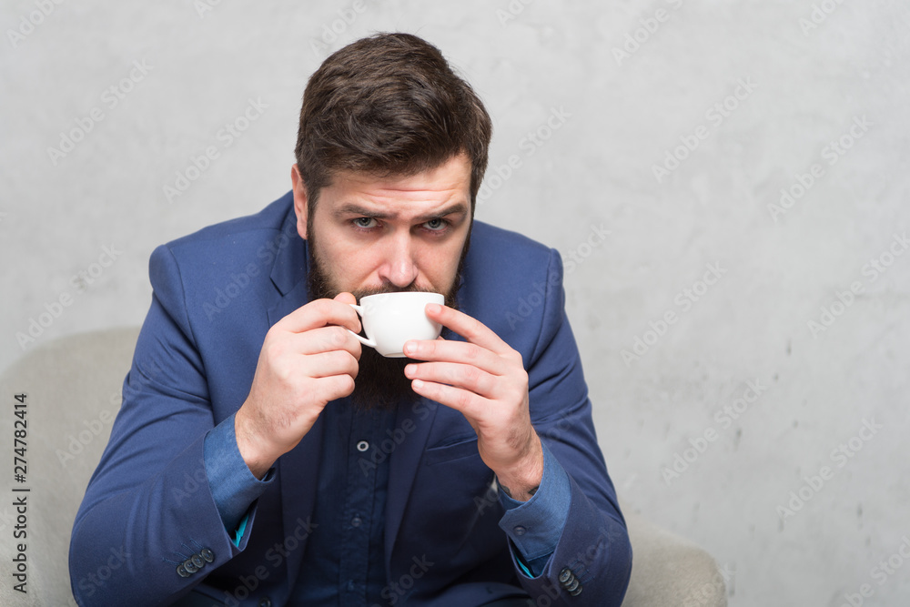 Coffee can do it best. Businessman drinking coffee before work. Bearded man enjoying coffee break at office. My perfect morning is spent drinking coffee Coffee can do it best. Businessman drinking coffee before work. Bearded man enjoying coffee break at office. My perfect morning is spent drinking coffee