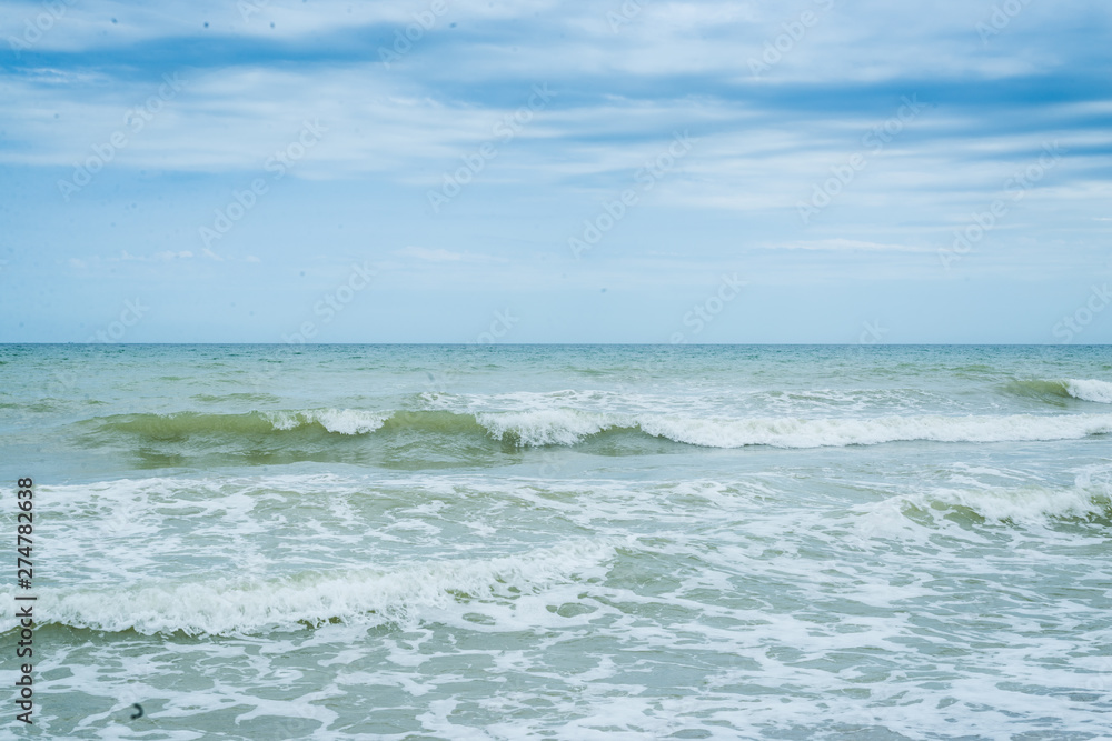 Sea surf on the beach. Waves coming ashore. Sea surf on the beach. Waves coming ashore.