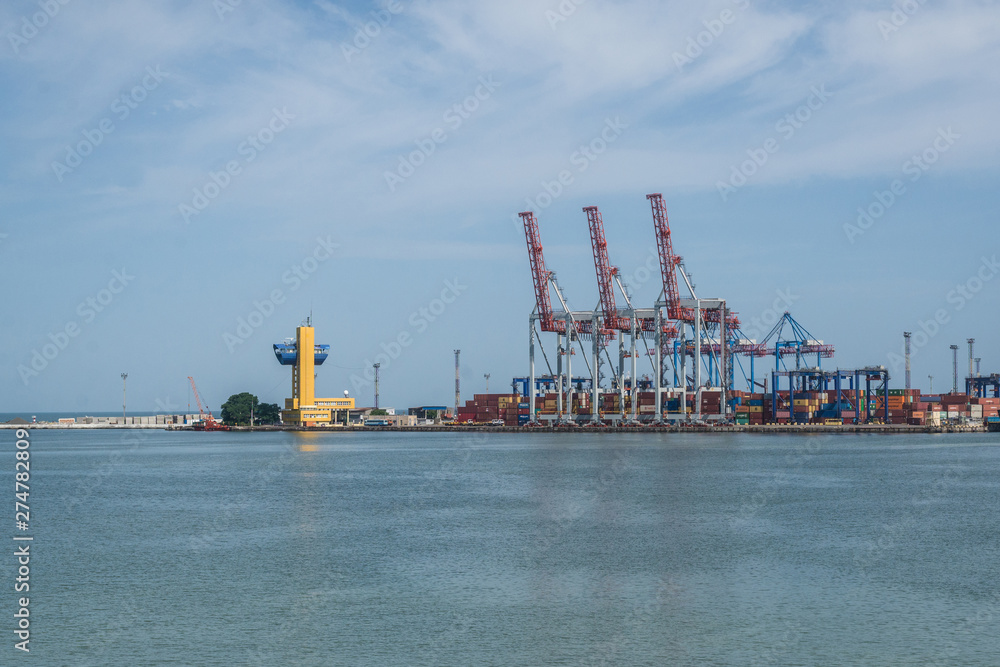 Odessa, Ukraine- June 17, 2019: Sea cargo port with cargo cranes and containers.