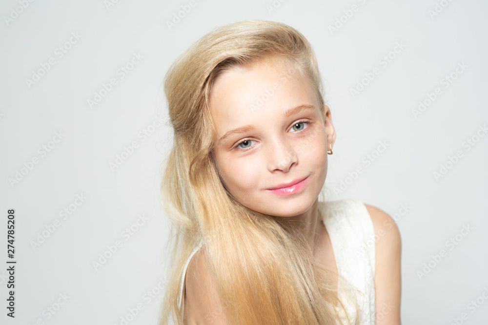 Young and beautiful. happy blond girl. skincare and natural makeup. hair care dyeing. blonde teen with soft skin. straightening. beauty hairdresser salon. healthy long hair with natural color Young and beautiful. happy blond girl. skincare and natural makeup. hair care dyeing. blonde teen with soft skin. straightening. beauty hairdresser salon. healthy long hair with natural color