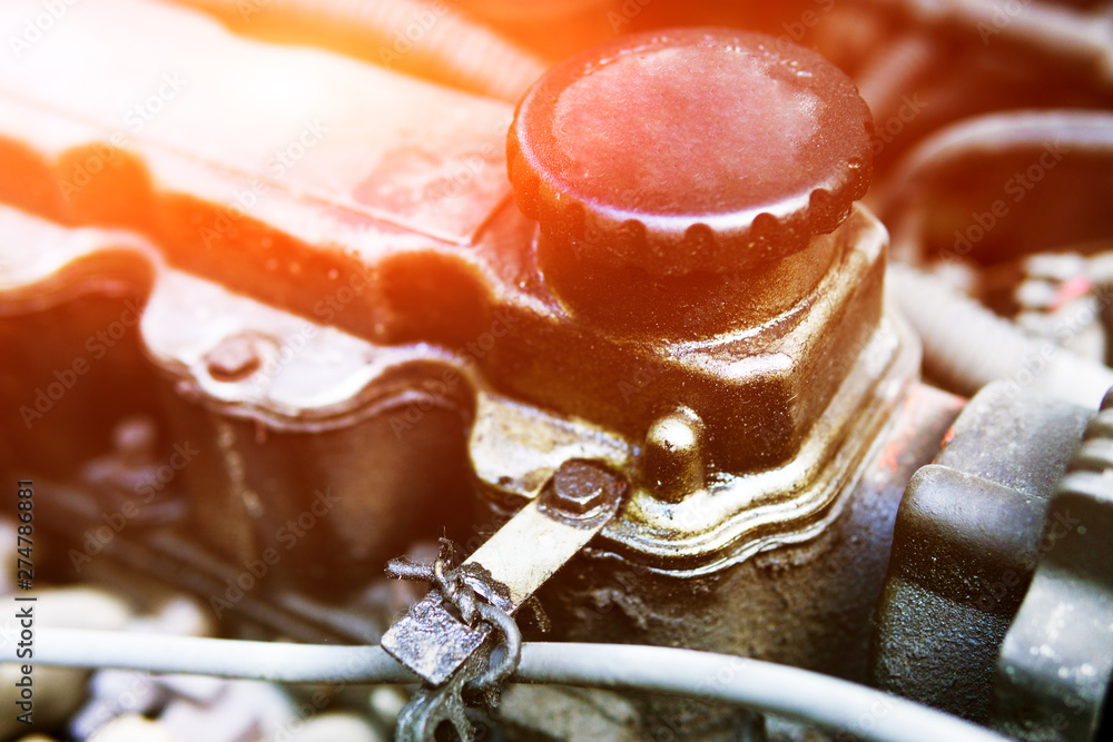 Oil plug on an internal combustion engine. Changing the oil in the car