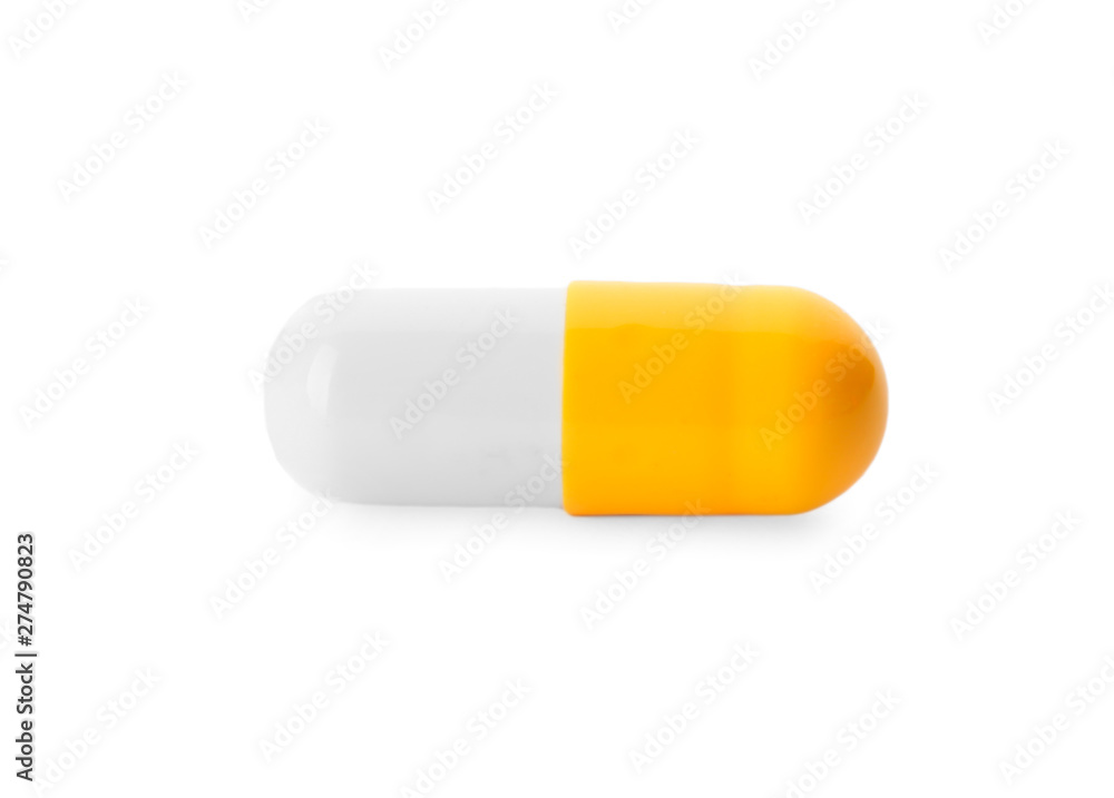 Color pill isolated on white. Medical treatment