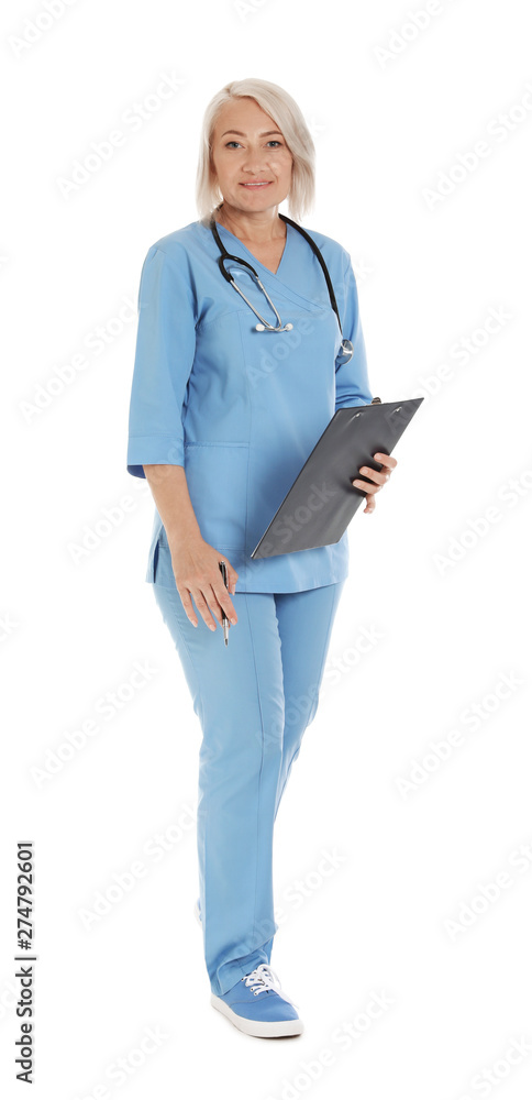 Full length portrait of female doctor in scrubs with clipboard isolated on white. Medical staff Full length portrait of female doctor in scrubs with clipboard isolated on white. Medical staff