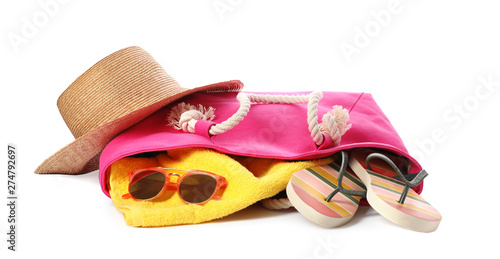 Different stylish beach accessories on white background