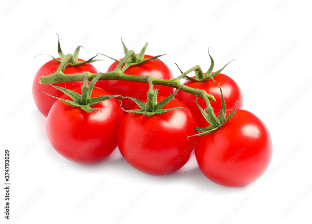 Branch of fresh cherry tomatoes isolated on white Branch of fresh cherry tomatoes isolated on white