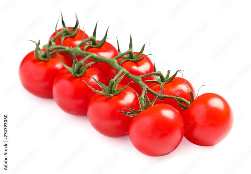 Branch of fresh cherry tomatoes isolated on white Branch of fresh cherry tomatoes isolated on white