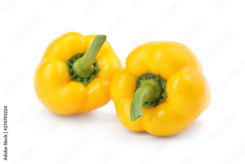 Ripe yellow bell peppers isolated on white Ripe yellow bell peppers isolated on white