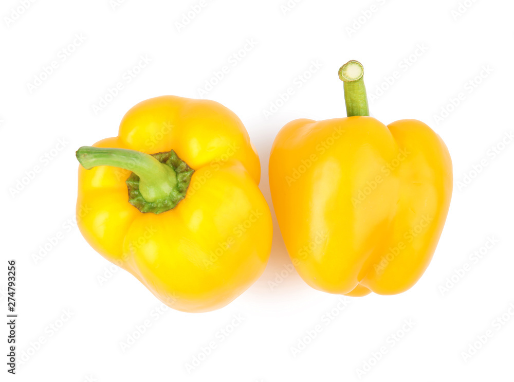 Ripe yellow bell peppers isolated on white, top view Ripe yellow bell peppers isolated on white, top view