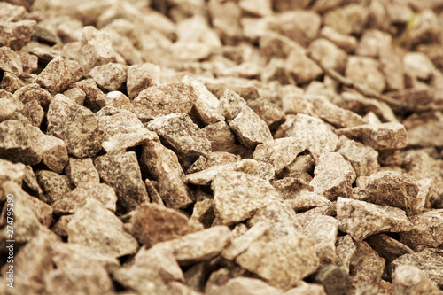 Road gravel and granite gravel texture. Crushed Gravel background. Pile of Stones texture. Industrial coals