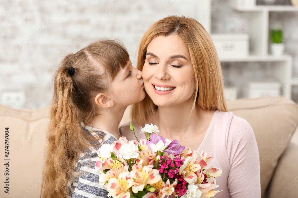 Little girl greeting her mother at home Little girl greeting her mother at home
