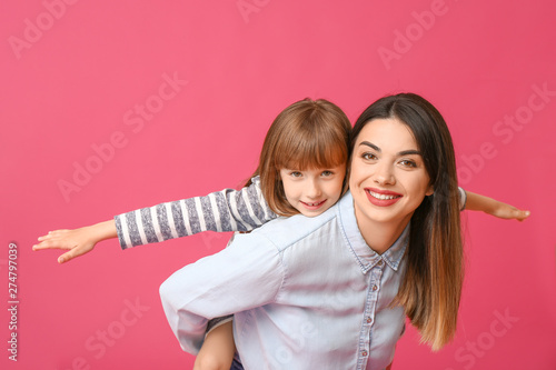 Portrait of happy mother an...