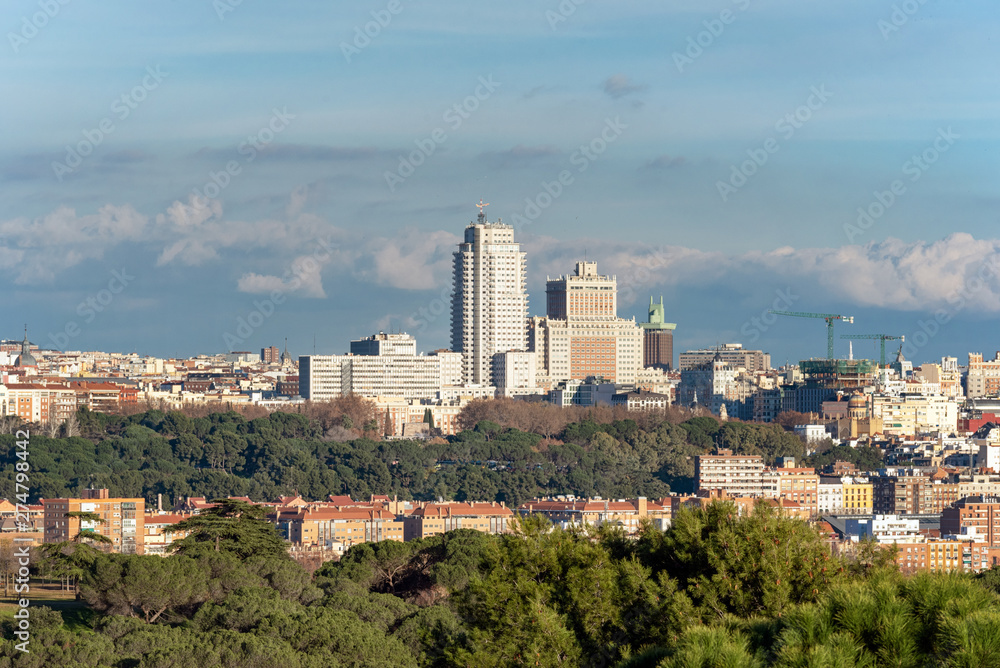 Panoramic view of Madrid skyline from the Casa de Campo park .