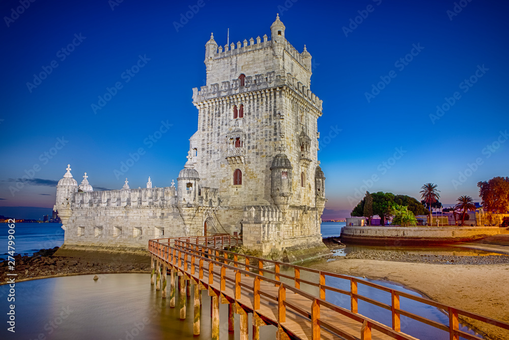 Belem Tower on Tagus River in Lisbon at Blue Hour in Portugal.