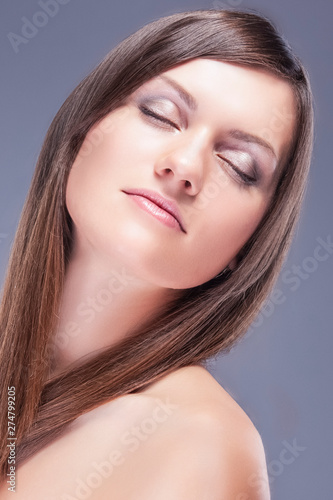 Portrait of Young Caucasian Female skin With Healthy Hair for Natural Cosmetic Makeup.