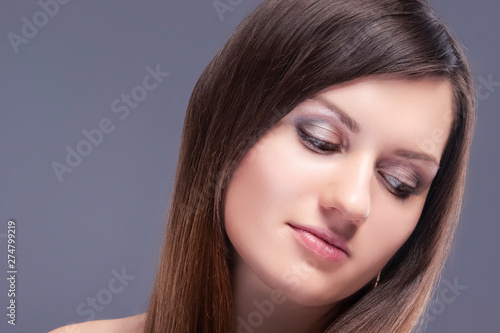 Closeup Beauty Portrait of Young Caucasian Female skin With Healthy Hair for Natural Cosmetic Makeup.