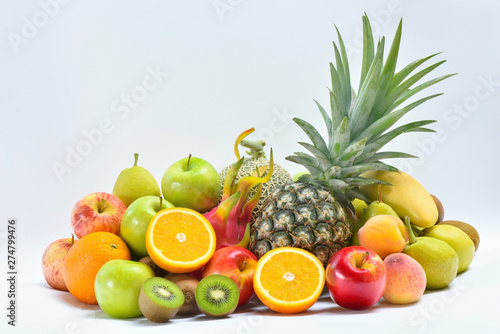 Stacked of tropical fresh fruits on white  Pineapple  Orange  Apple and Kiwi