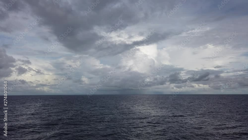 Stormy clouds over dark ocean ready for raining Stormy clouds over dark ocean ready for raining