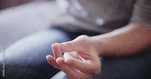 Blood sugar, diabetes and healthcare concept - a woman takes a blood sample with a lancet and measures blood sugar levels with a glucose meter at home.