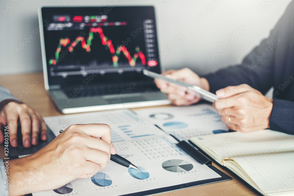 Business Team Investment Entrepreneur Trading discussing and analysis graph stock market trading,stock chart concept Business Team Investment Entrepreneur Trading discussing and analysis graph stock market trading,stock chart concept