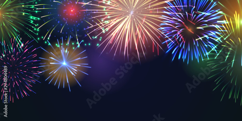 Fireworks festive banner with space for text. Realistic fireworks explosions and brightly shining sparks. Pyrotechnics show vector illustration. Colorful light performance at deep blue background