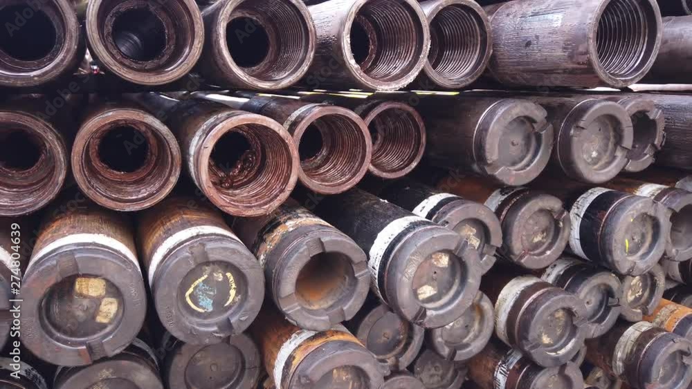Stack of drill pipe for oil and gas well drilling on the main deck of the offshore drilling rig. Stack of drill pipe for oil and gas well drilling on the main deck of the offshore drilling rig.