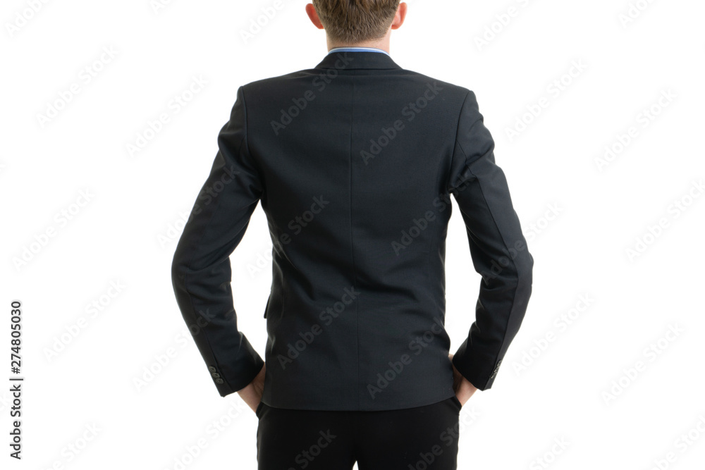 Happy young businessman in suit looking back on white background, isolated concept Happy young businessman in suit looking back on white background, isolated concept