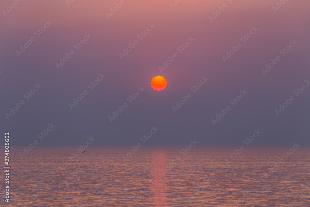 A fantastic view of the sunrise on the beach in summer, Korean Sokcho A fantastic view of the sunrise on the beach in summer, Korean Sokcho