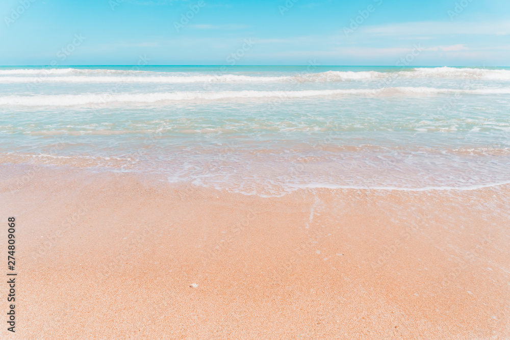 Tropical nature clean beach and white sand in summer with sun light blue sky and bokeh background. Tropical nature clean beach and white sand in summer with sun light blue sky and bokeh background.