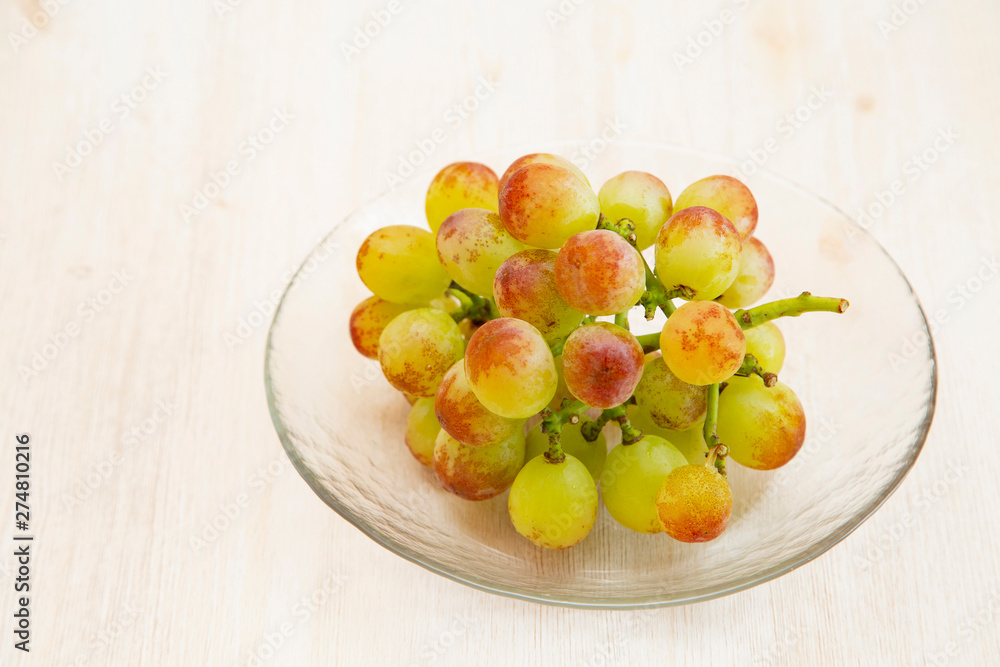 Muscat grape on the white background Muscat grape on the white background
