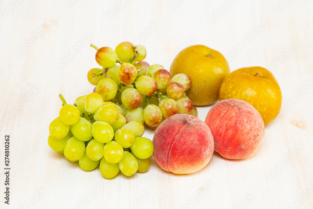 Muscat grape ,peach,peer on the white background Muscat grape ,peach,peer on the white background