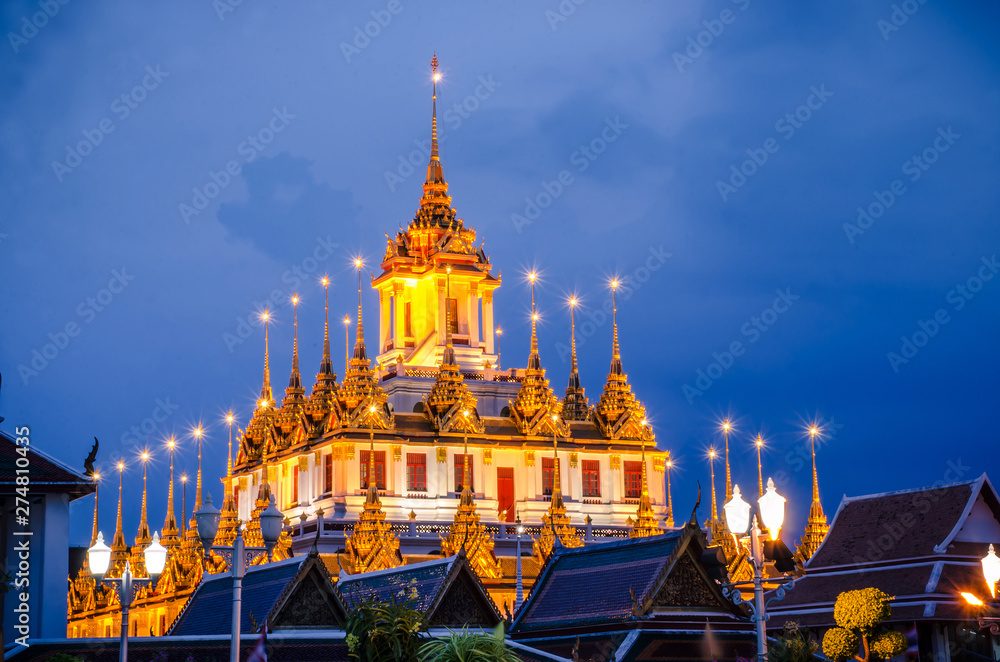 Cityscape Wat Ratchanatdaram Temple the beautiful golden castle or pagoda Bangkok, Thailand in sunset time. Cityscape Wat Ratchanatdaram Temple the beautiful golden castle or pagoda Bangkok, Thailand in sunset time.