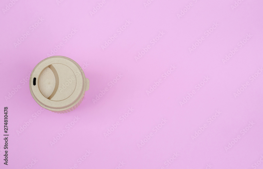 Top view image of coffee paper cup on pink pastel background. Copy space . Top view image of coffee paper cup on pink pastel background. Copy space .