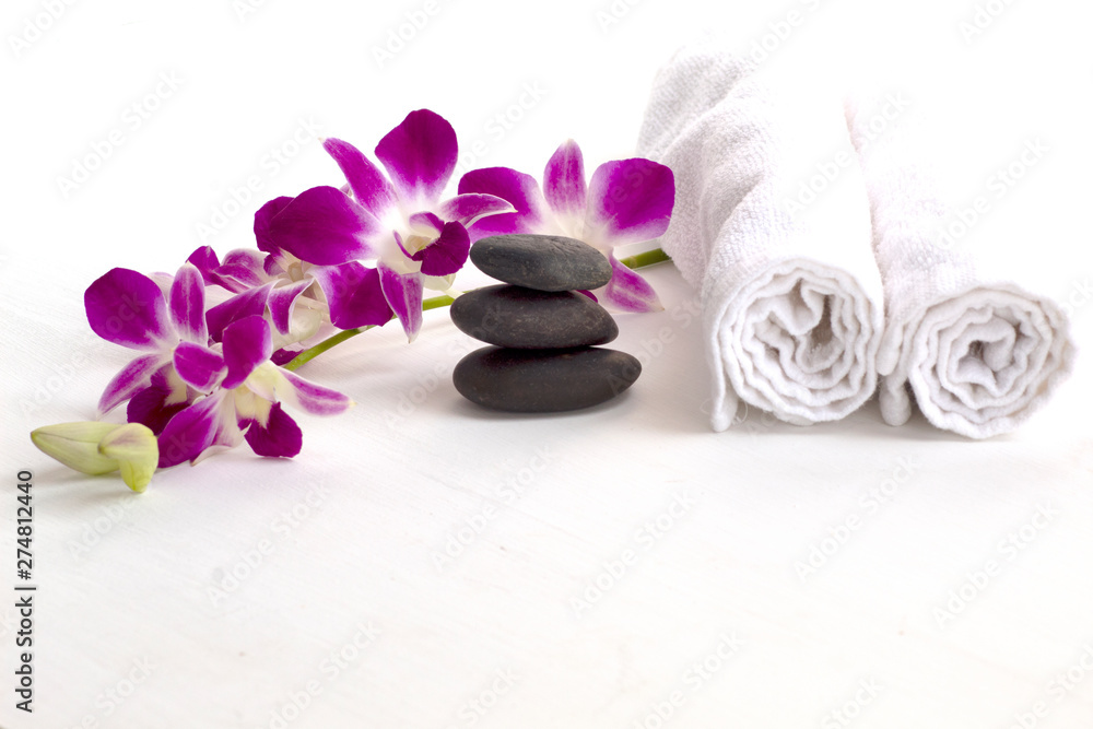 stone spa and orchid on white background stone spa and orchid on white background