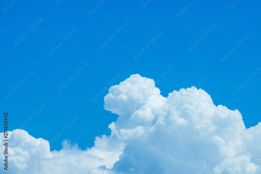 Naklejka premium Blue sky background with white clouds.
