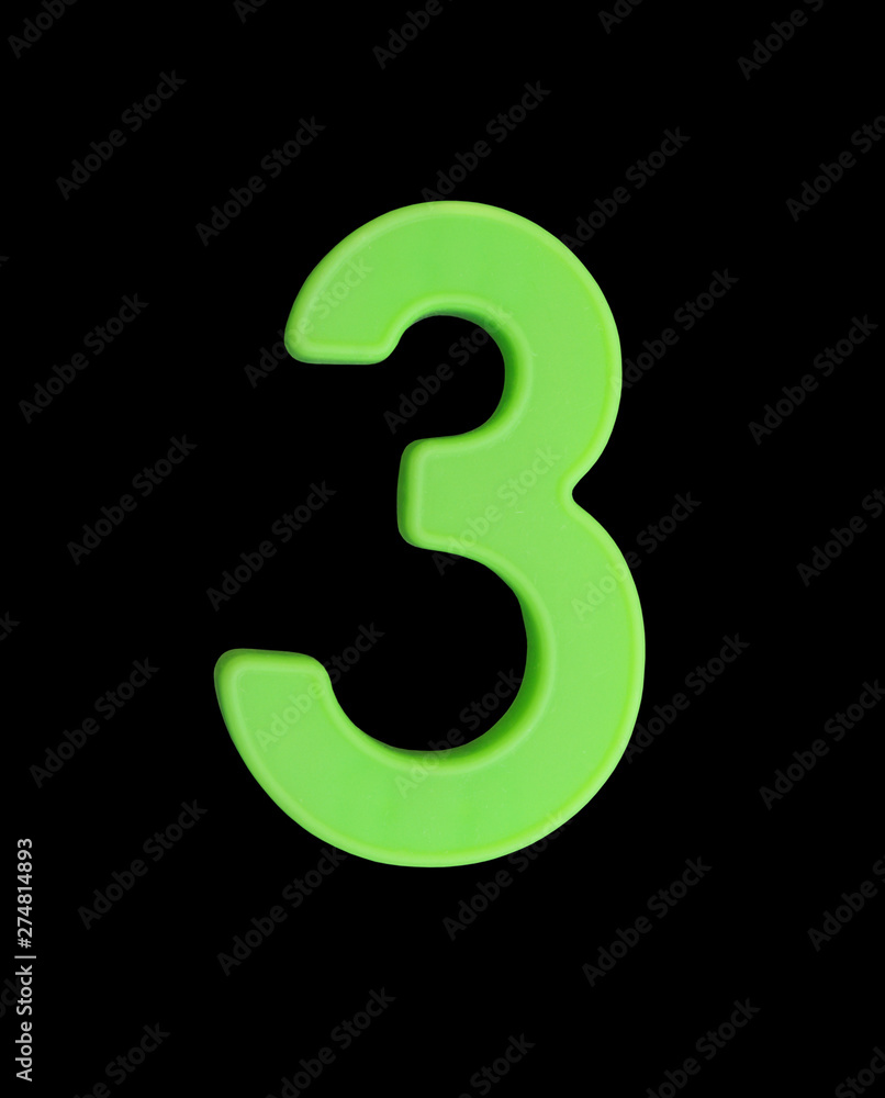 Plastic number isolated on black background, number 3 Plastic number isolated on black background, number 3