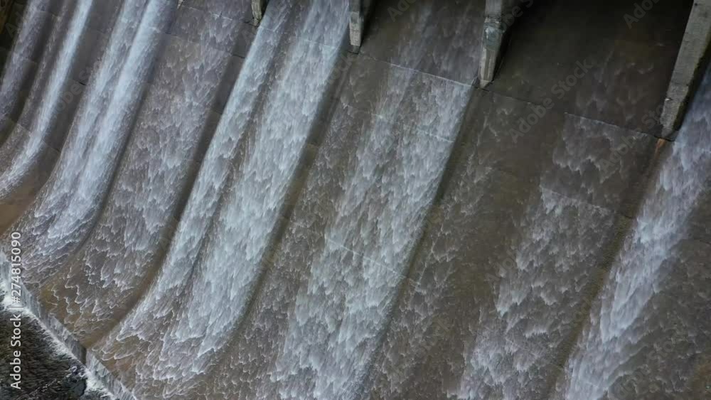 Water cascading down the side of Ripogenus Dam AERIAL PAN Water cascading down the side of Ripogenus Dam AERIAL PAN