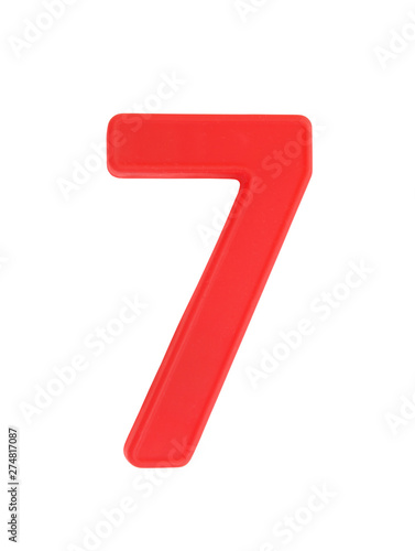 Plastic number isolated on white background, number 7