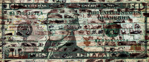 US Dollar banknote on a brick wall