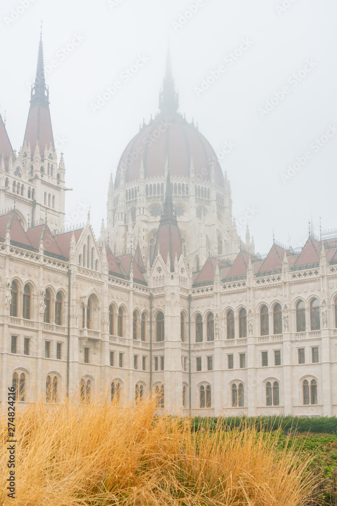 Foggy view of the Hungarian Parliament Building in a haze morning