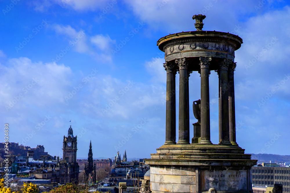 Beautiful view Dugald Stewart Monument from hilltop of Calton Hill in central Edinburgh, Scotland, UK