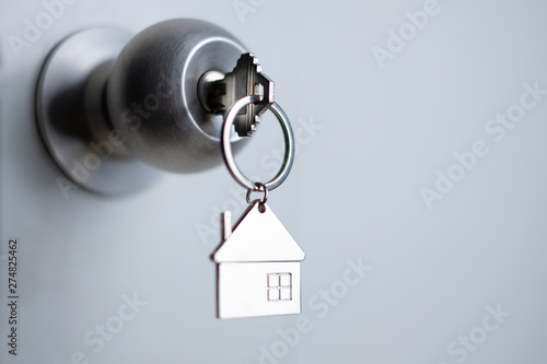 closeup key on the door, personal loan concept. soft focus.