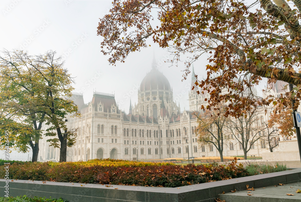 Foggy view of the Hungarian Parliament Building in a haze morning